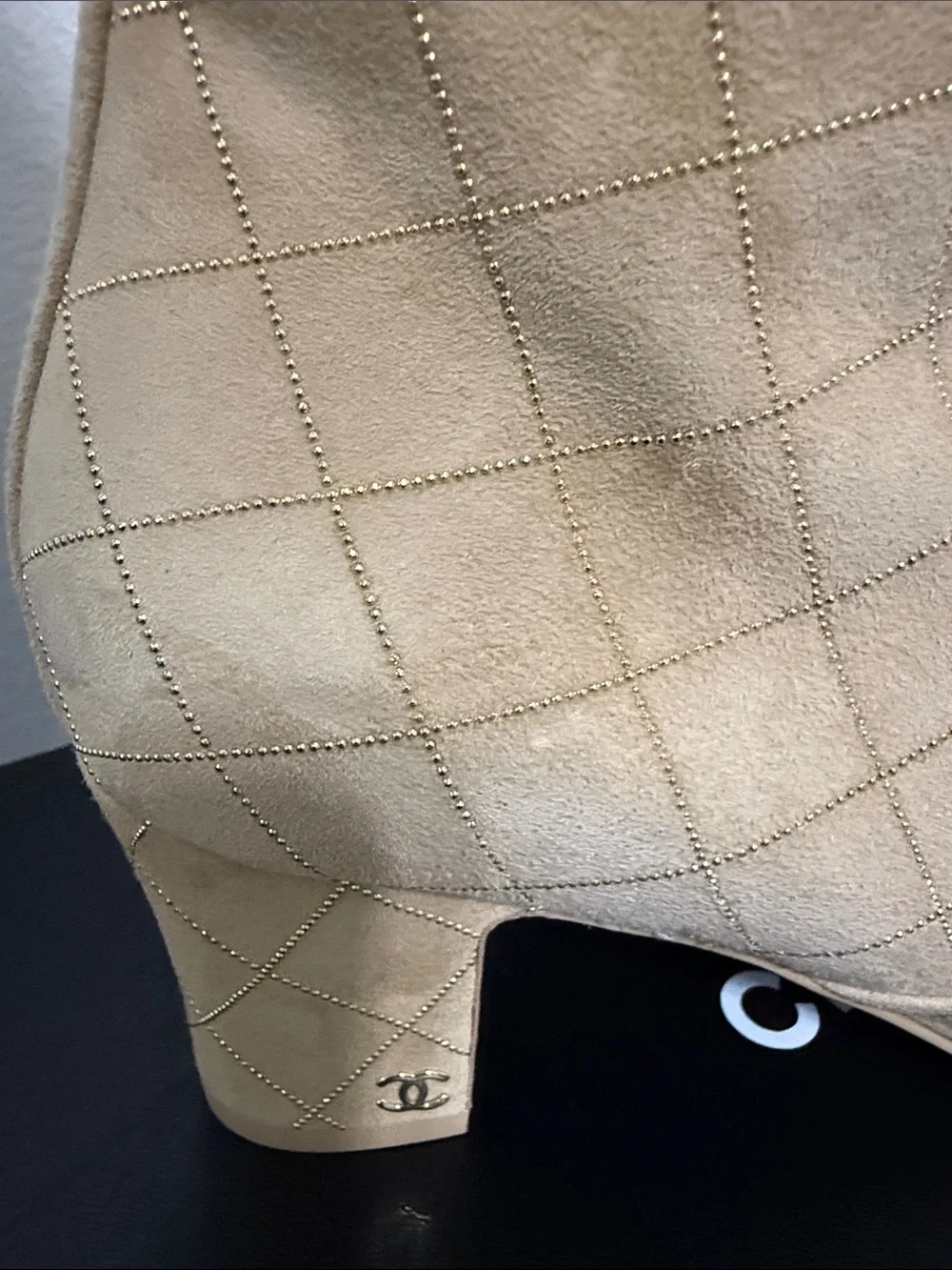 CHANEL Beige Quilted Ankle Boots with Black Cap Toe